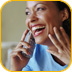 Young girl laughing on the telephone
